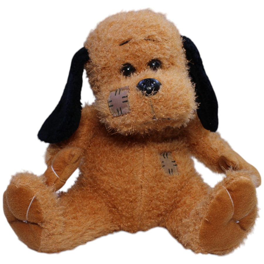 Süßer Hund mit Flicken, sitzend