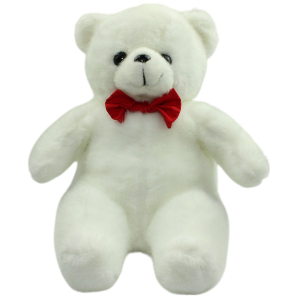 Weißer Teddy mit roter Fliege, sitzend