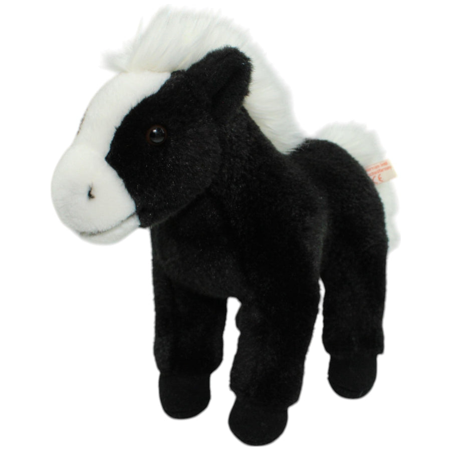 Schwarzes Pferd mit weißer Mähne, stehend