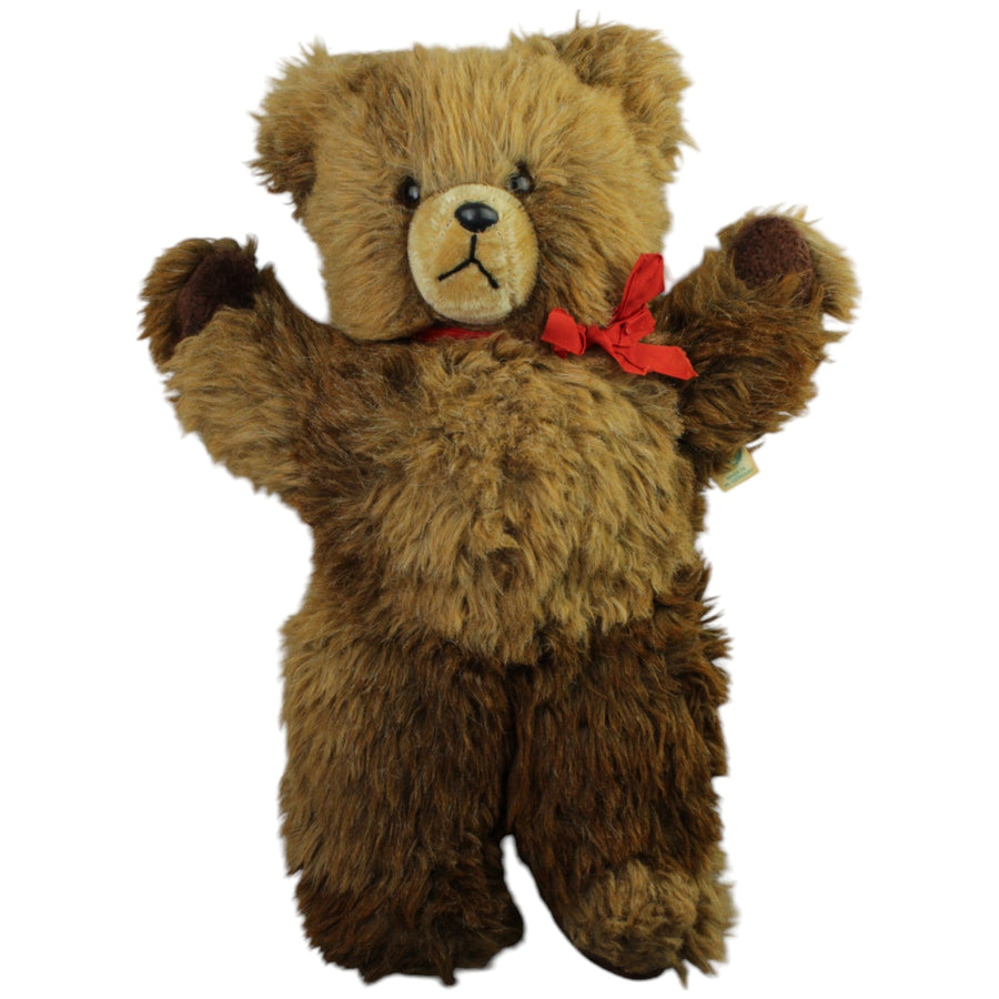 Schöner Teddybär mit roter Schleife