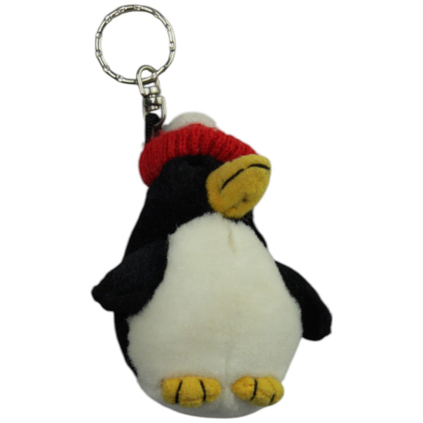 Pinguin mit roter Wintermütze