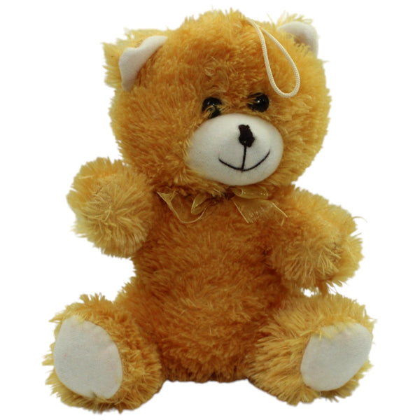 Gelber zotteliger Teddy, sitzend