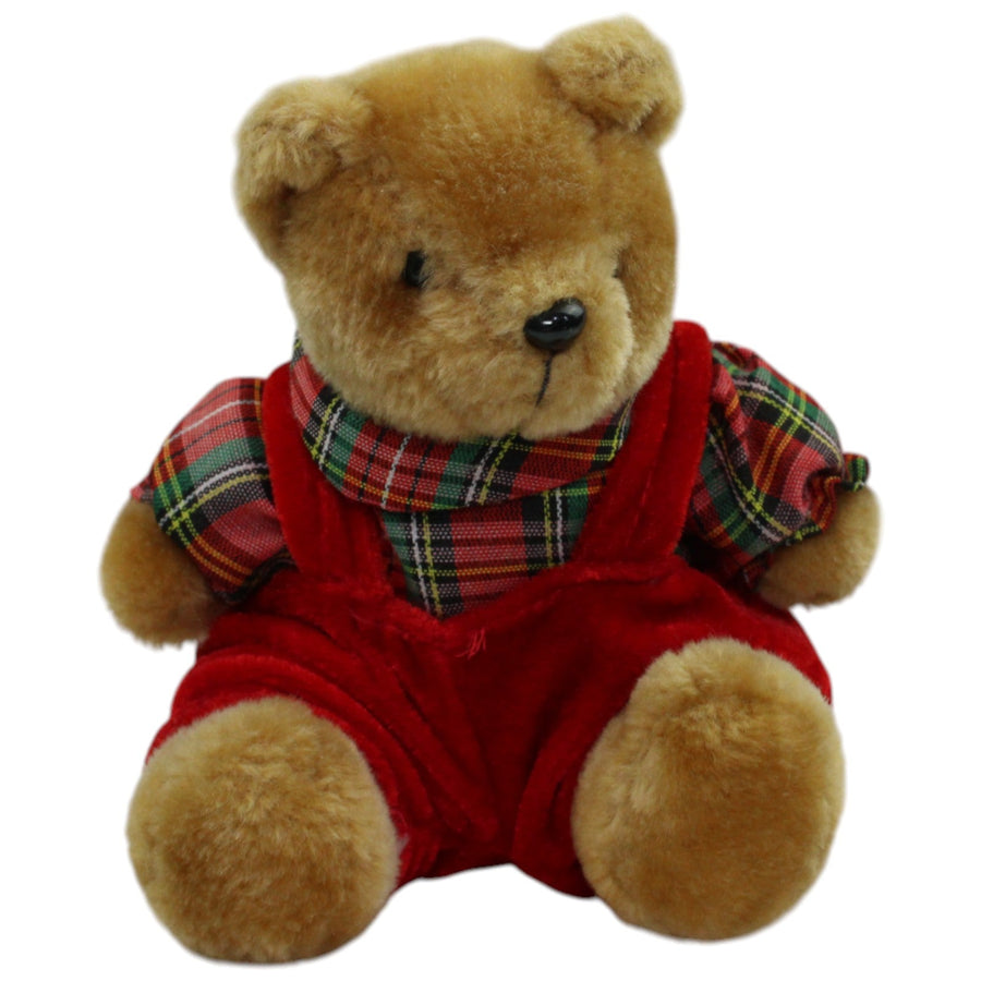 Teddybär mit roter Latzhose