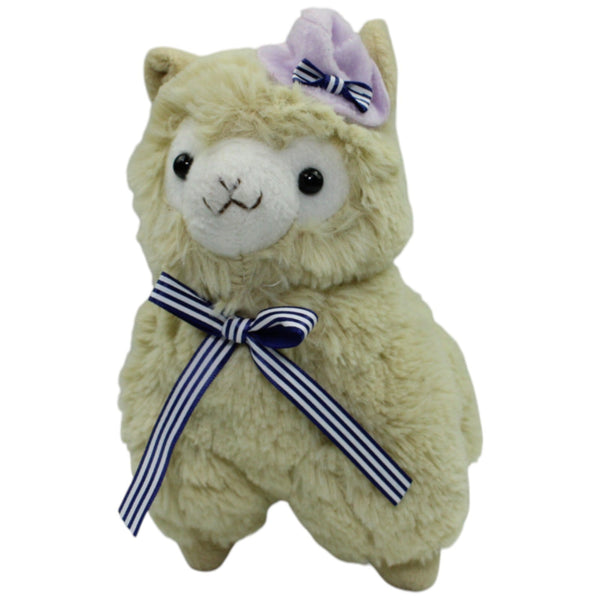 Alpacasso, Alpaka mit lila Hut und Schleife