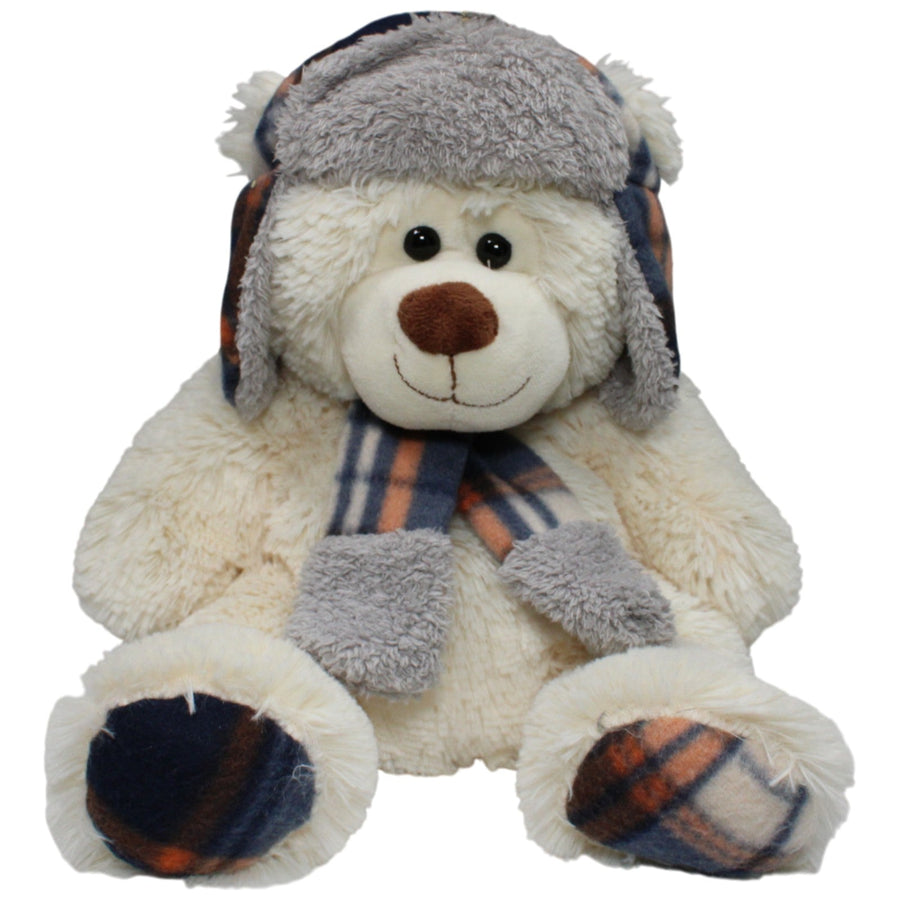 Großer weißer Teddybär mit Mütze und Schal