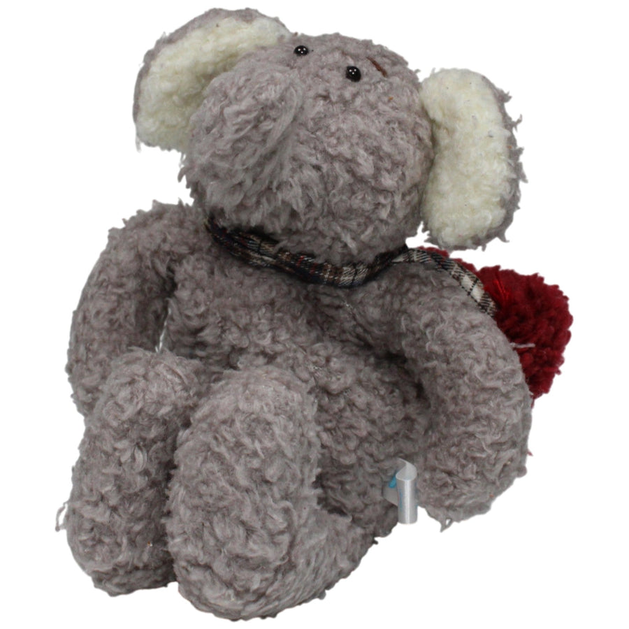 Zotteliger Elefant mit Schal