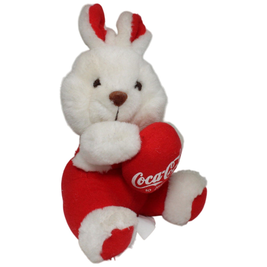 Coca-Cola, sitzender weißer Hase mit Ei "to jest radość"