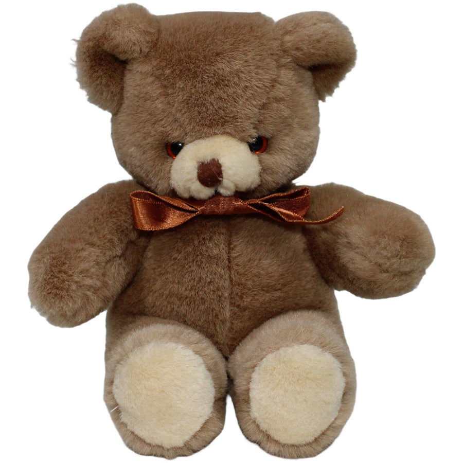 Teddy mit bronzener Schleife, sitzend