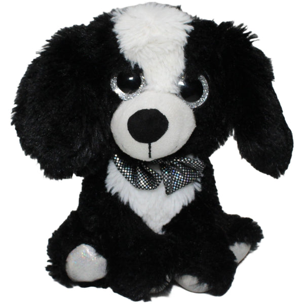 Hund mit Glitzer-Fliege, sitzend