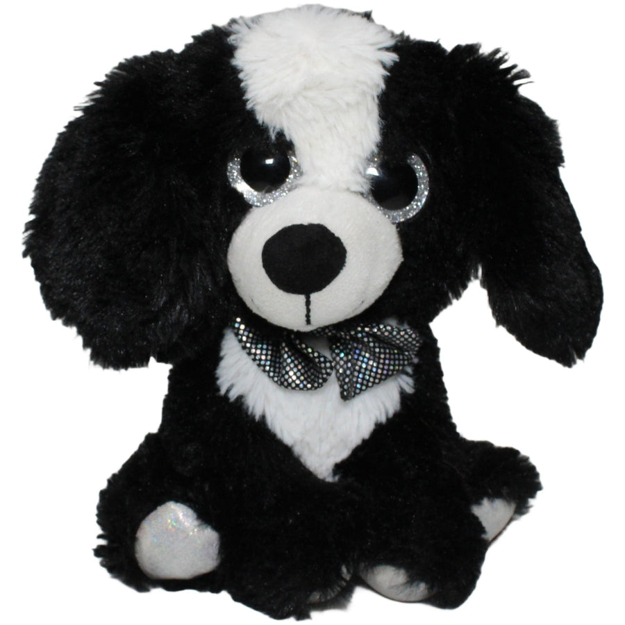 Hund mit Glitzer-Fliege, sitzend