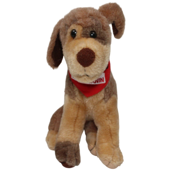 Sitzender Hund mit rotem Halstuch