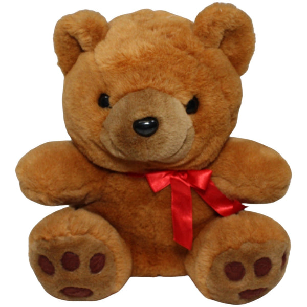 Teddy mit roter Schleife, sitzend