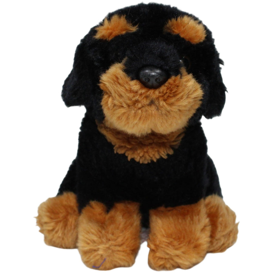 Kleiner Rottweiler, sitzend