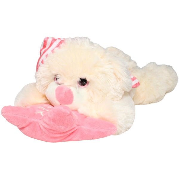 Liegender Teddy mit rosa Sternenkissen