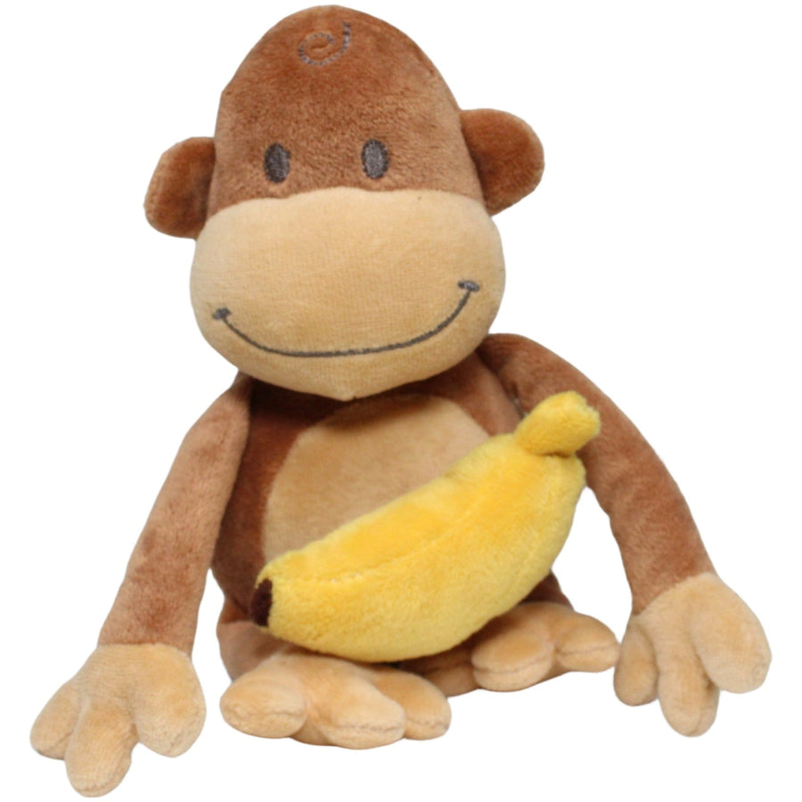 Brauner Affe mit Banane, sitzend