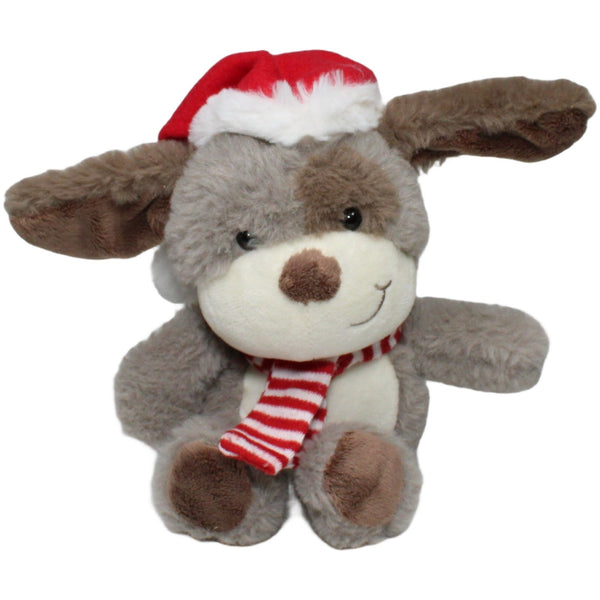 Grauer Hund mit Weihnachtsmütze und Schal, sitzend