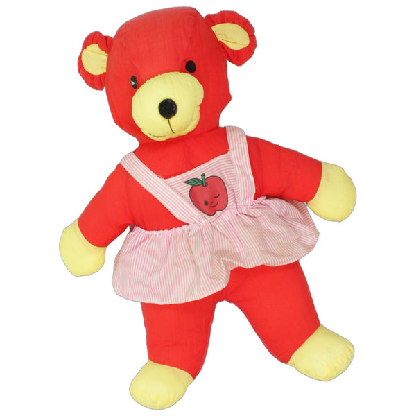 Roter XL Teddybär mit gestreiftem Kleid