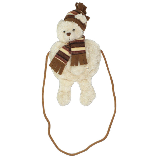 Süßer Teddybär mit Schal und Mütze