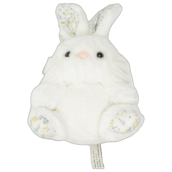 Weißer Hase mit Blumenmuster an den Ohren und Füßen