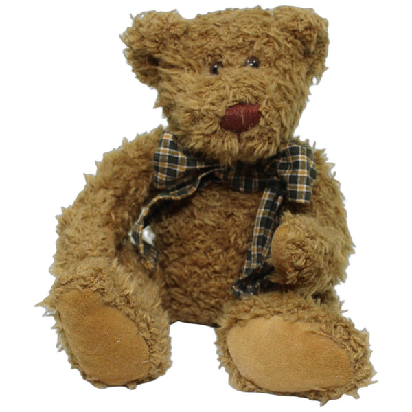 Brauner Bär mit Schleife, sitzend