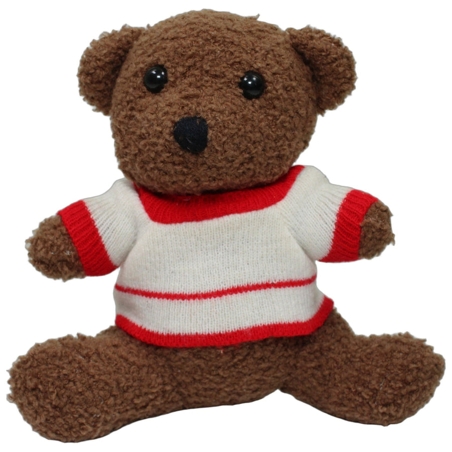 Brauner Teddy mit weiß-rotem Pullover, sitzend