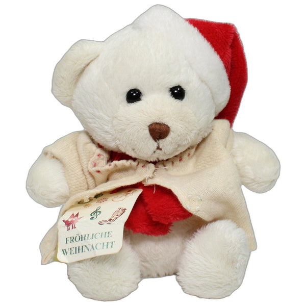 Weißer Eisbär mit Weihnachtsmütze, sitzend