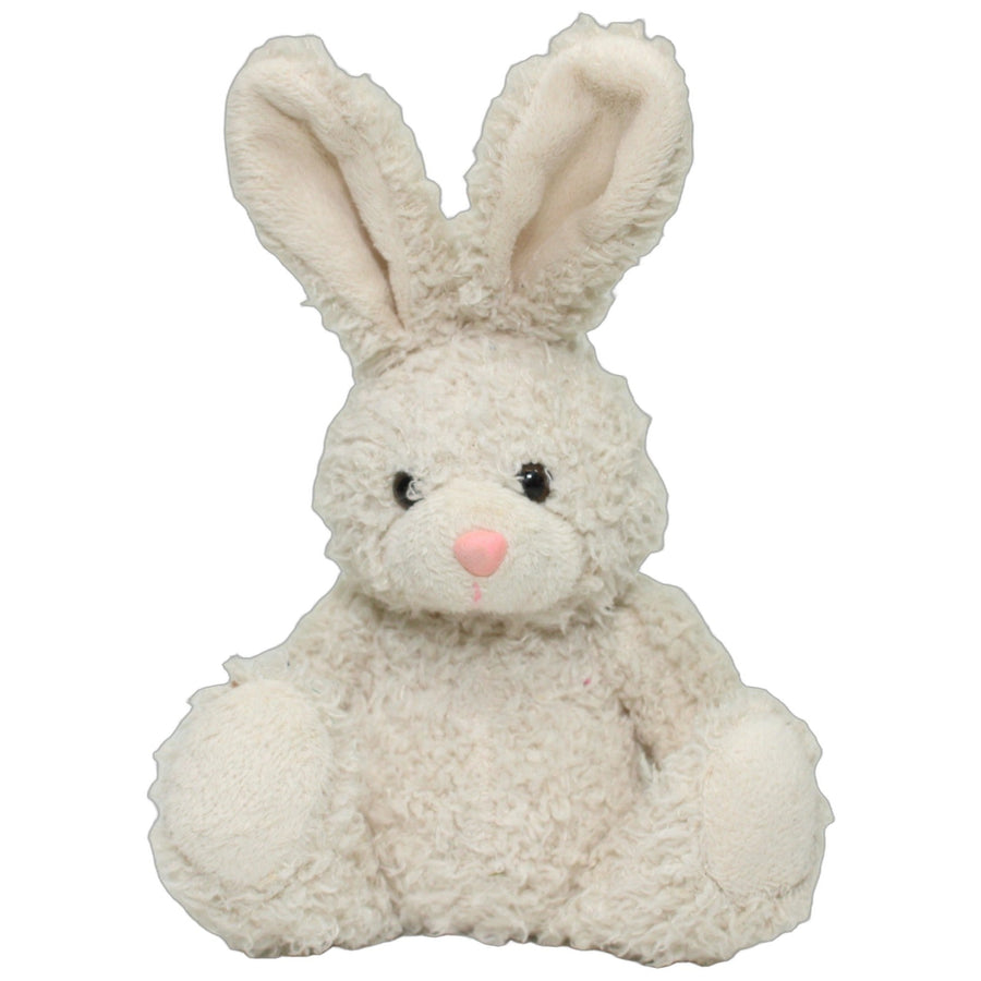 Weißer zotteliger Hase, sitzend