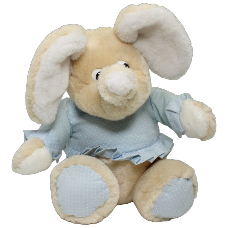 Beiger Elefant mit hellblauem Oberteil, sitzend