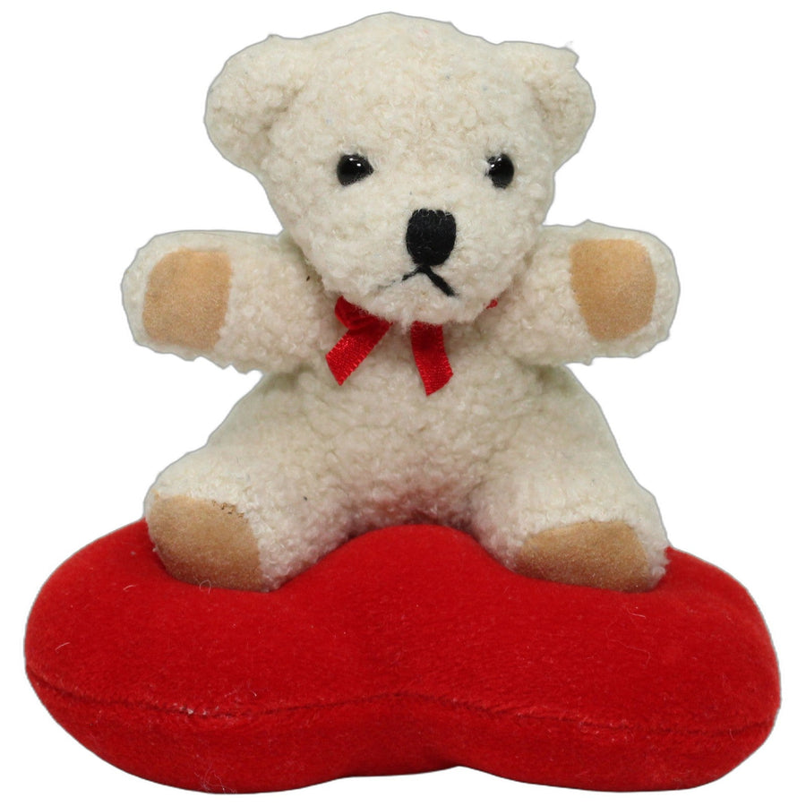 Heller Teddybär auf Herz