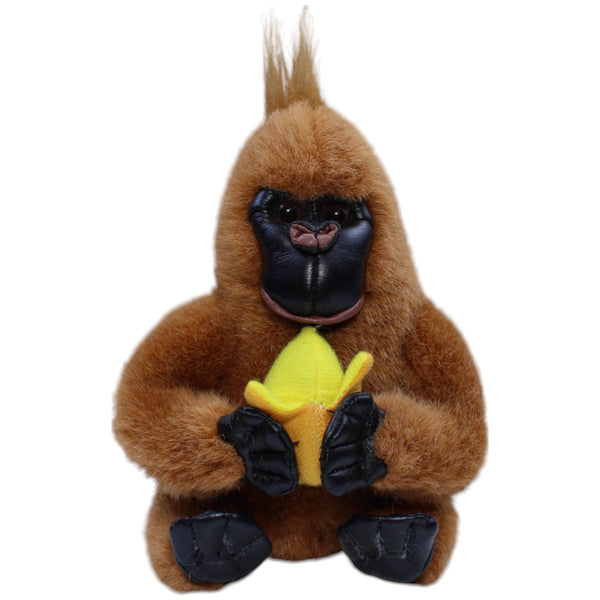 Brauner Gorilla mit Banane