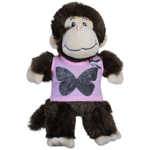 Süßer Affe mit rosa Shirt