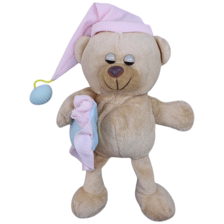 Müder Teddy mit Schlafmütze und Kissen