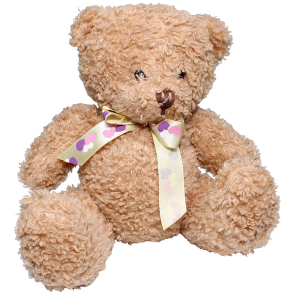 Teddybär sitzend mit Herz-Schleife