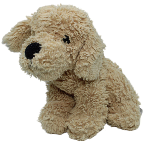 Hund sitzend, beige