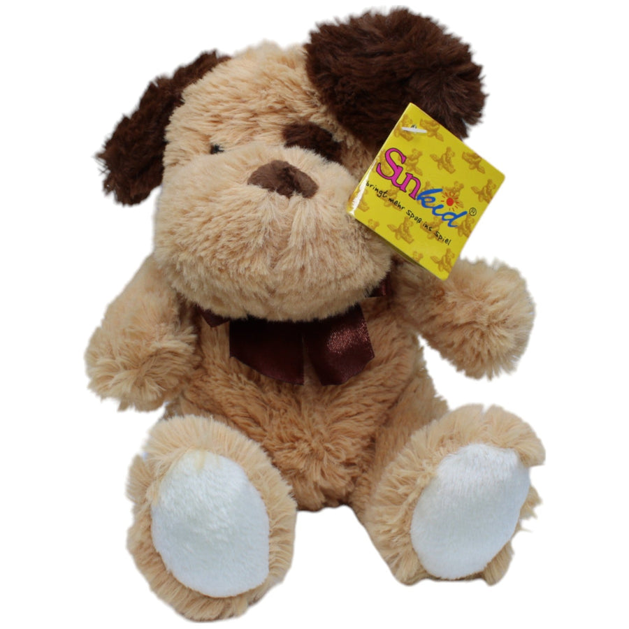 Hund mit brauner Schleife