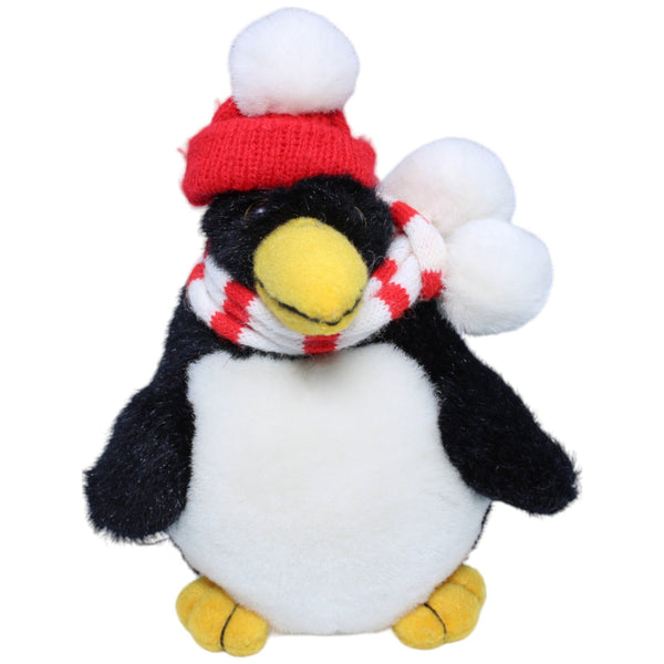 Pinguin mit Mütze und Schal