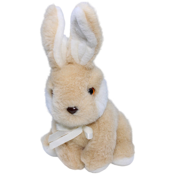 Hase mit weißer Schleife, sitzend