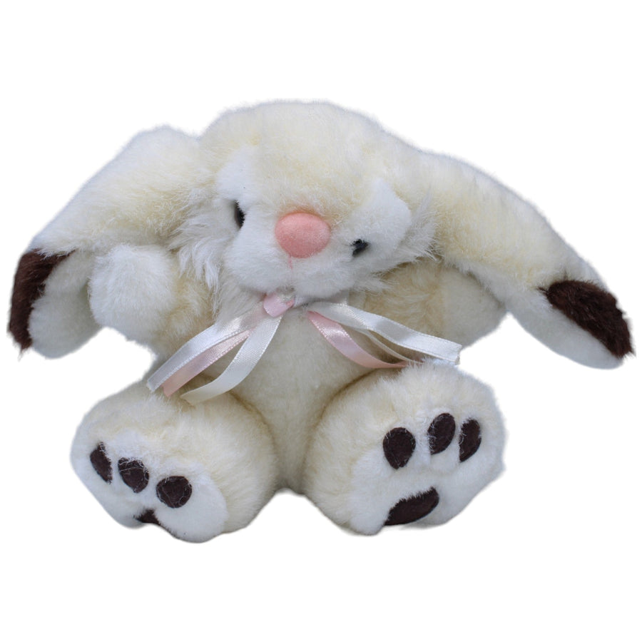 Hübscher weißer Hase mit Schleife