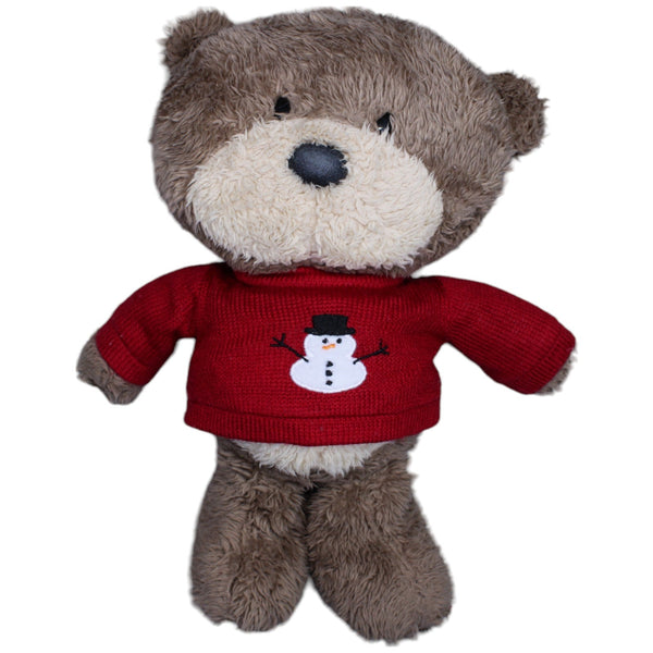 Brauner Teddybär mit rotem Weihnachts-Pullover