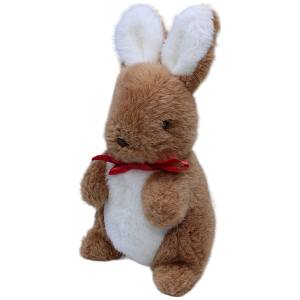 Süßer Hase mit roter Schleife