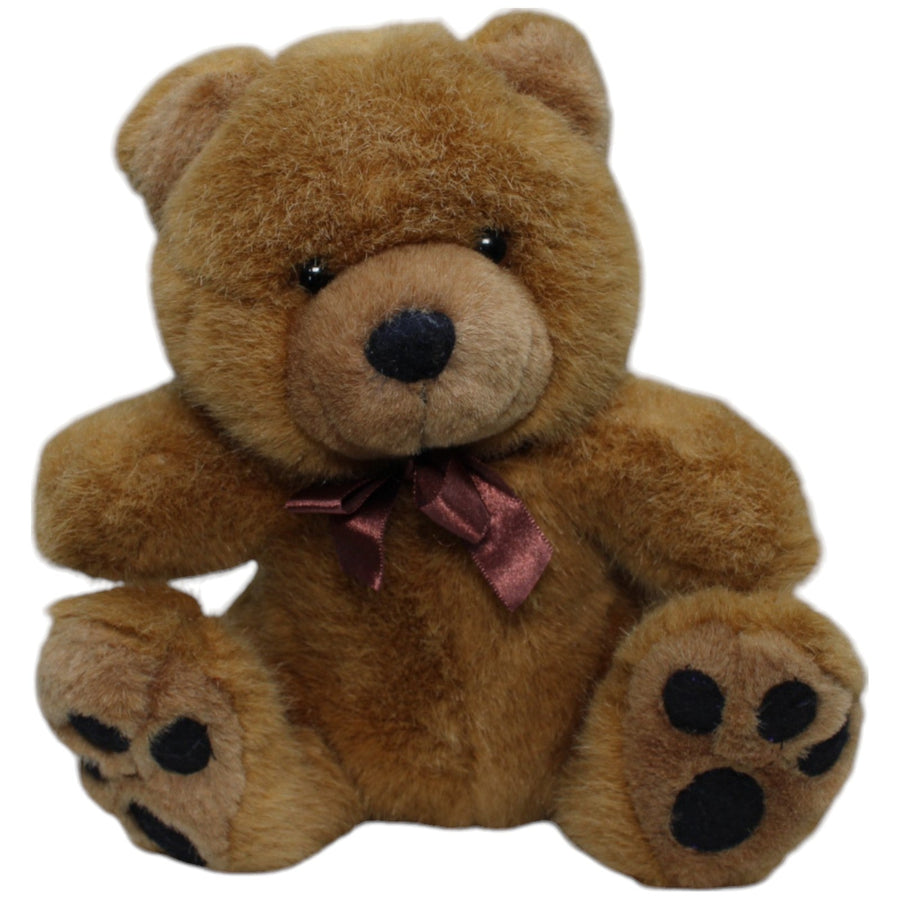 Brauner Bär mit Schleife, sitzend