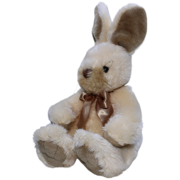 Hase mit goldener Schleife, sitzend