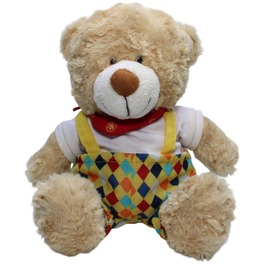 Süßer Bär in bunter Latzhose, sitzend