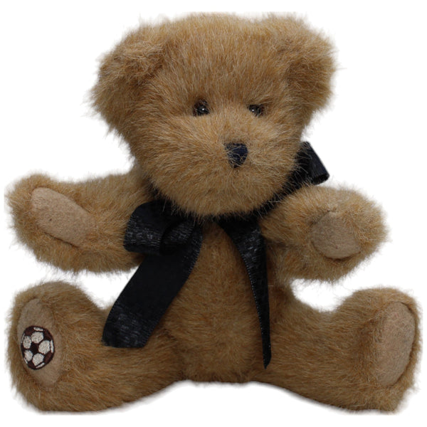 Teddybär mit schwarzer Schleife
