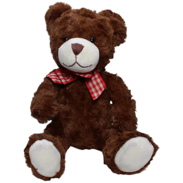 Schöner Teddybär mit rot-weißer Schleife