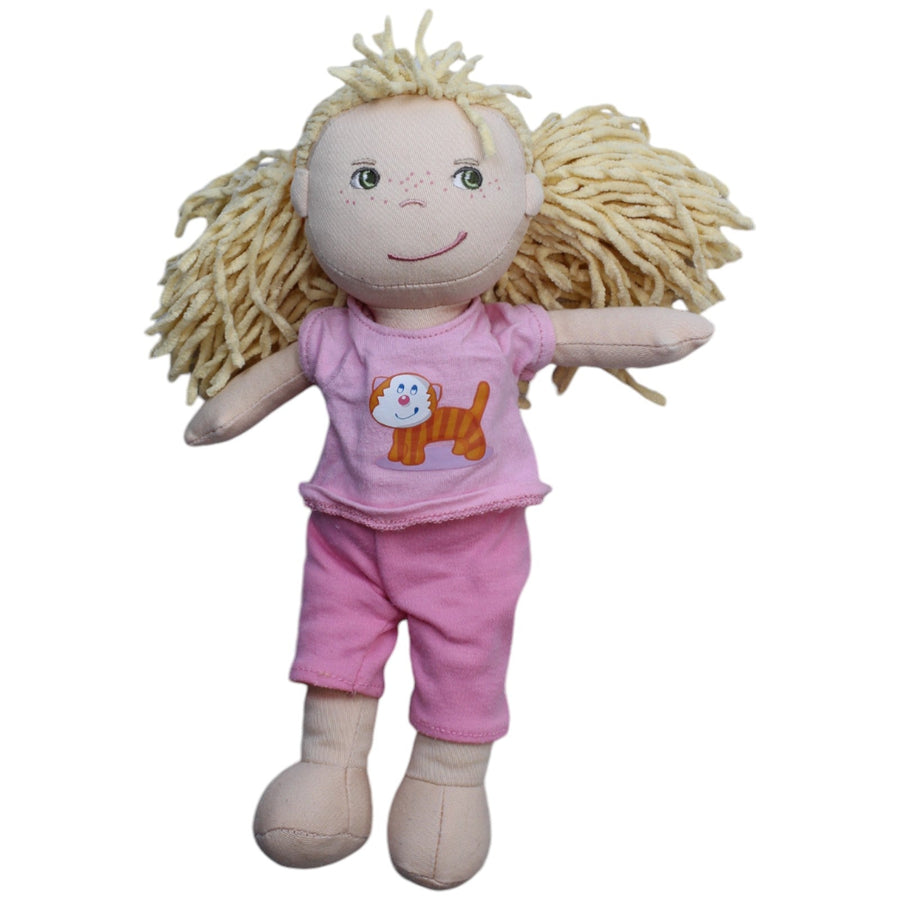 Blondes Mädchen mit Katzen-Shirt