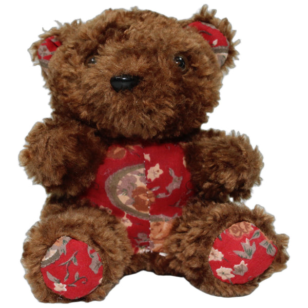 Kleiner Teddy mit rotem Blumen-Muster