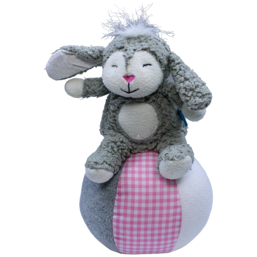 Hase auf Ball mit Rassel